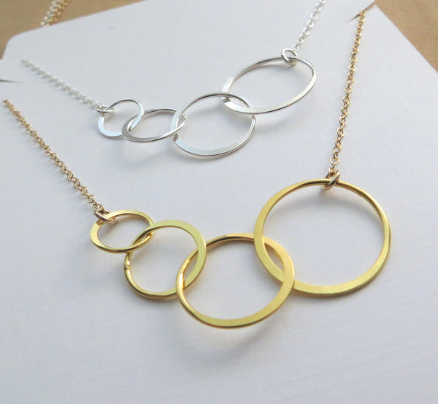Four rings for four decades necklace - RayK designs