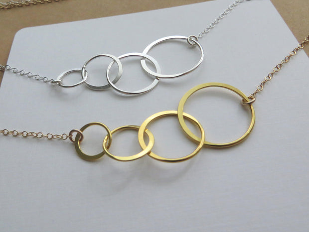 Four rings for four decades necklace - RayK designs